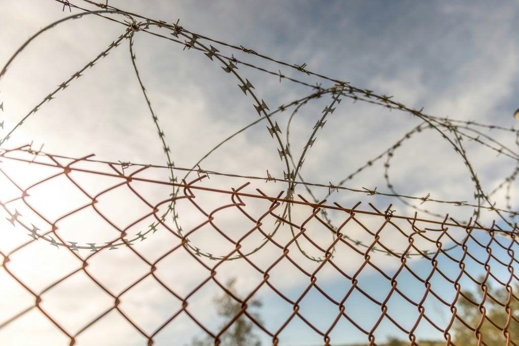 Barbed wire fence - Photo by Eddie Blair on Unsplash